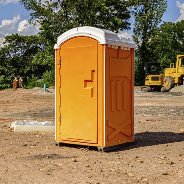 what is the cost difference between standard and deluxe portable restroom rentals in Carnot-Moon